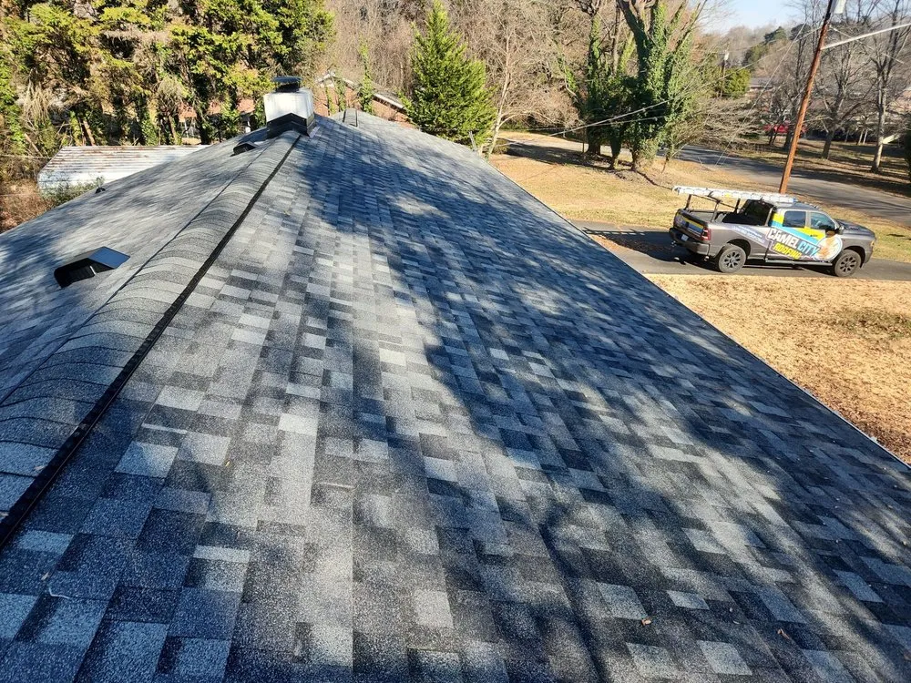 Top-rated flat roof repair after storm damage in Winston-Salem, NC by Camel City Roofing
