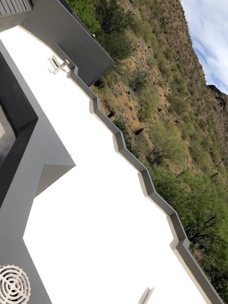 Slide of Camelback Roofing