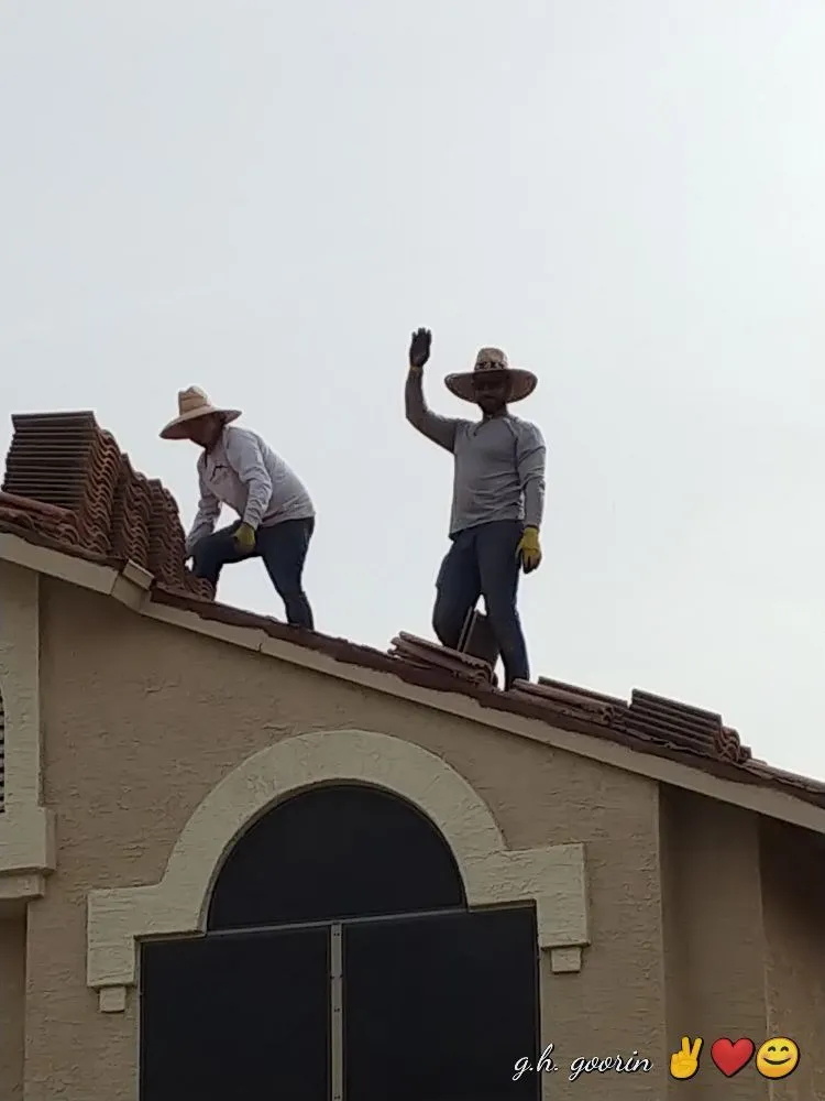 Slide of Camelback Roofing