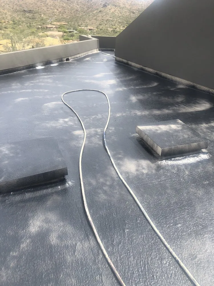 Slide of Camelback Roofing