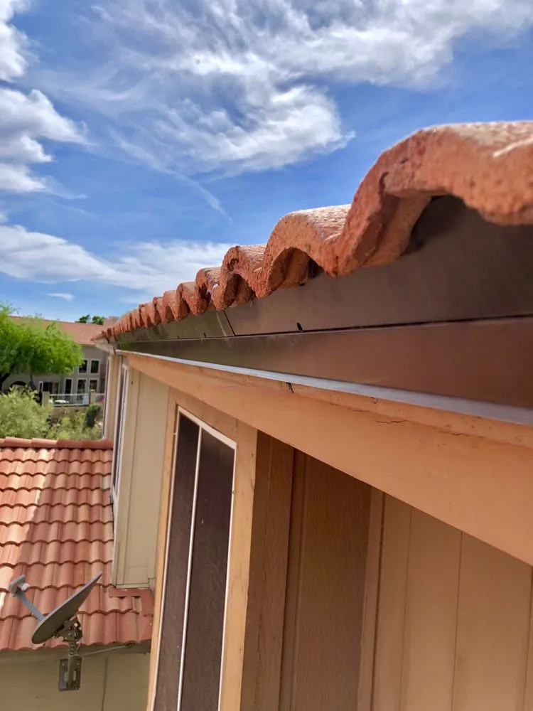 Slide of Camelback Roofing