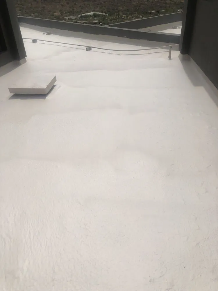 Slide of Camelback Roofing