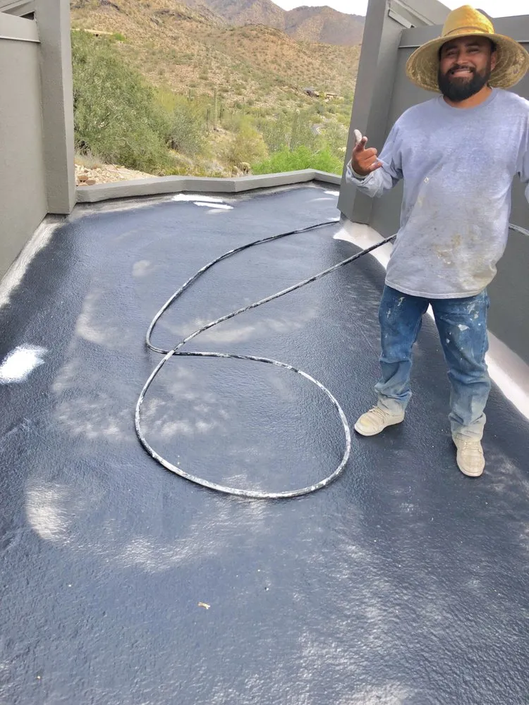 Slide of Camelback Roofing