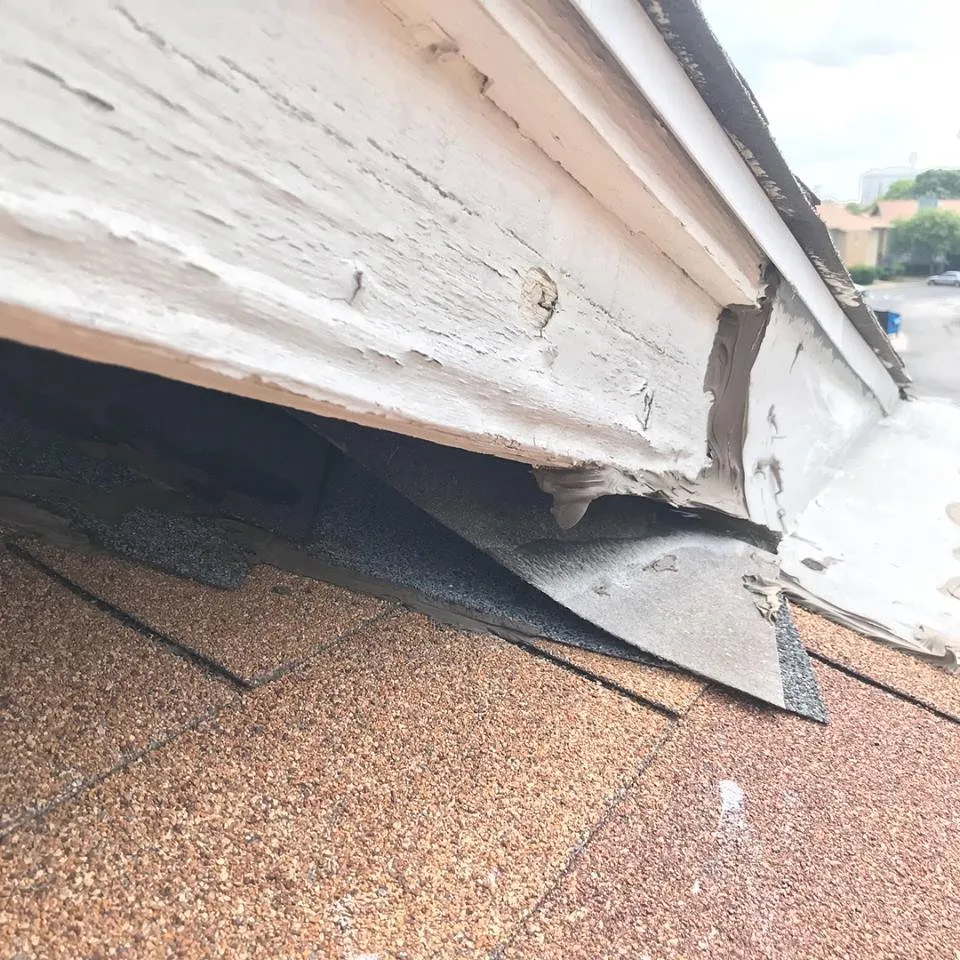 Slide of Camelot Roofing