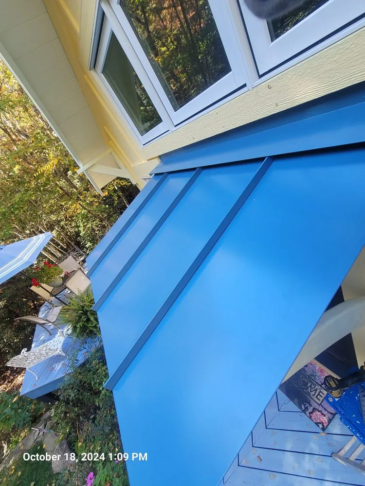 Slide of Cameron Reese Metal Roofing Construction