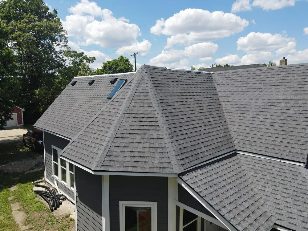 Slide of CAM'S Roofing