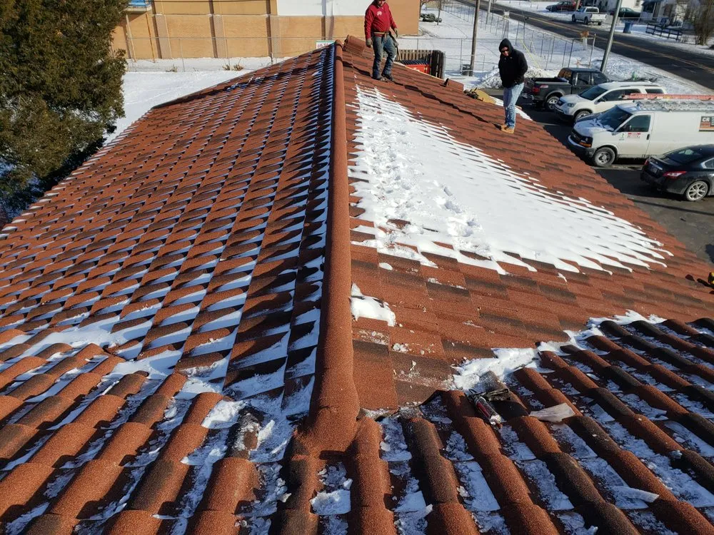 Slide of CAM'S Roofing