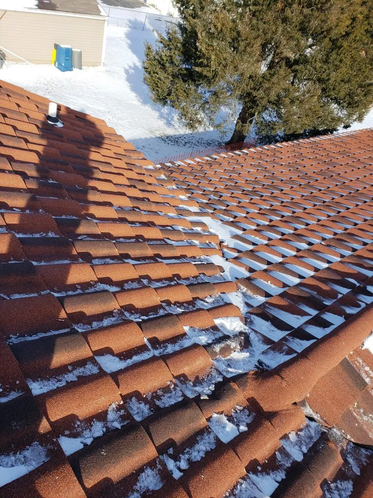 Slide of CAM'S Roofing