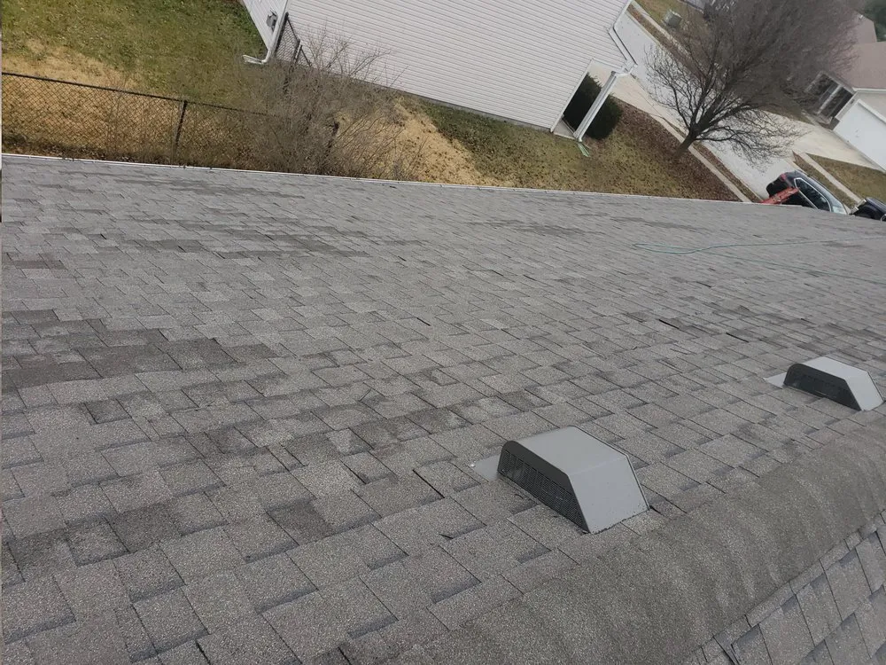 Slide of CAM'S Roofing