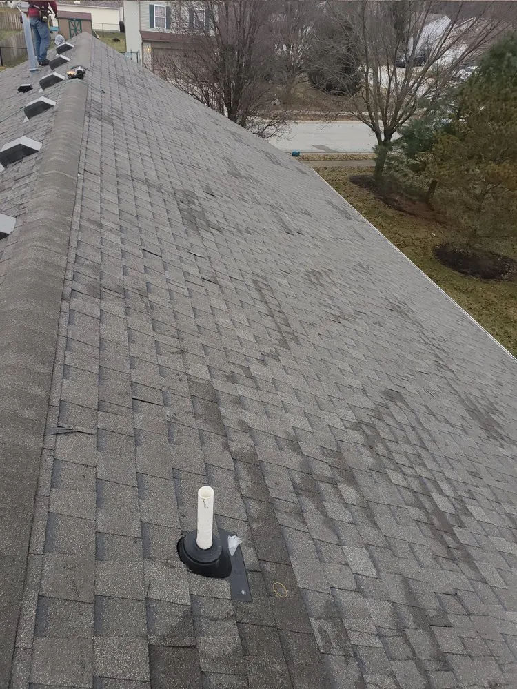 Slide of CAM'S Roofing