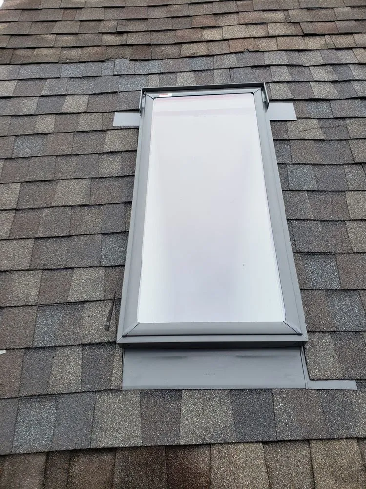 Slide of CAM'S Roofing