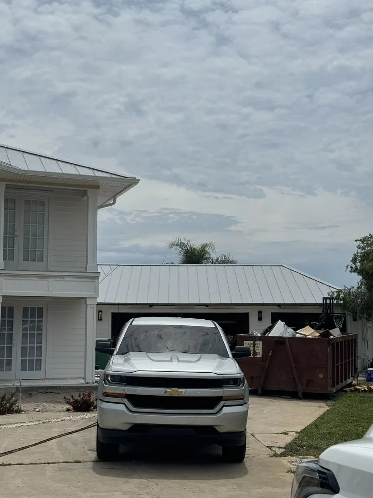 Slide of Can Am Roofing