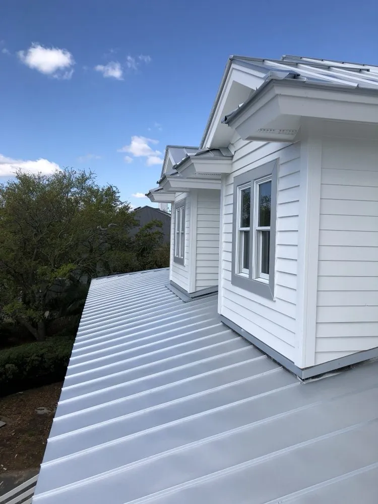 Slide of Canaan roofing and gutters