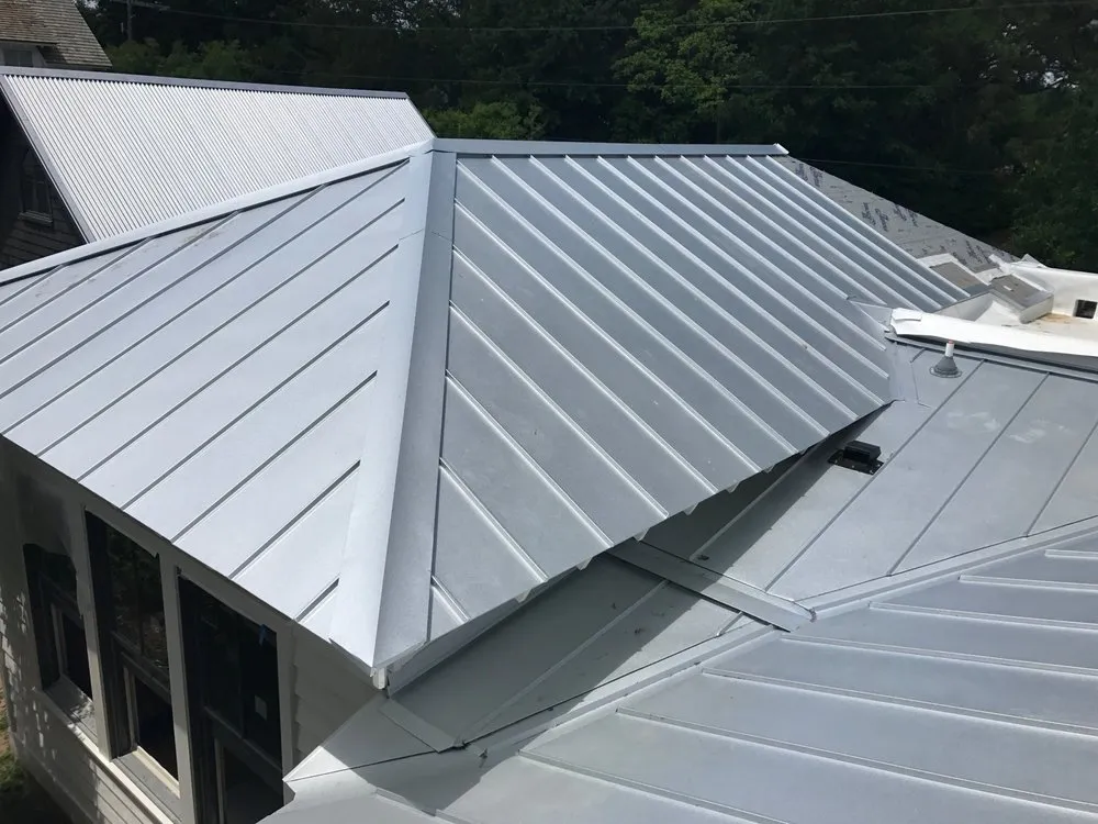 Slide of Canaan roofing and gutters