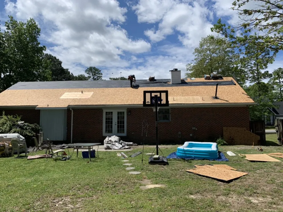 Slide of Canaan Roofing