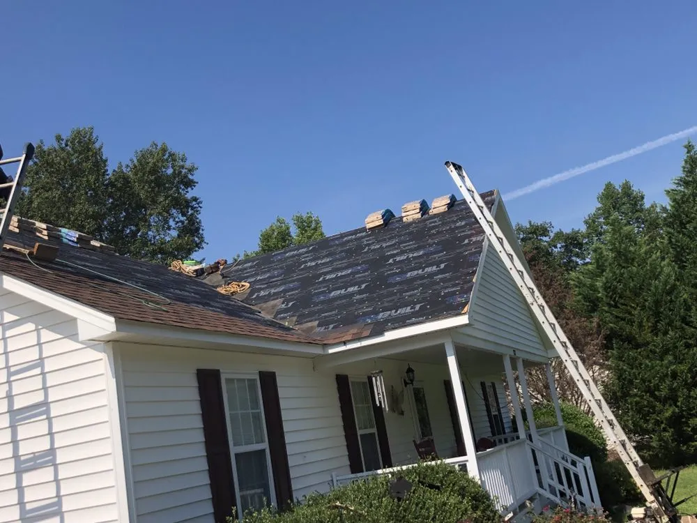 Slide of Canaan Roofing