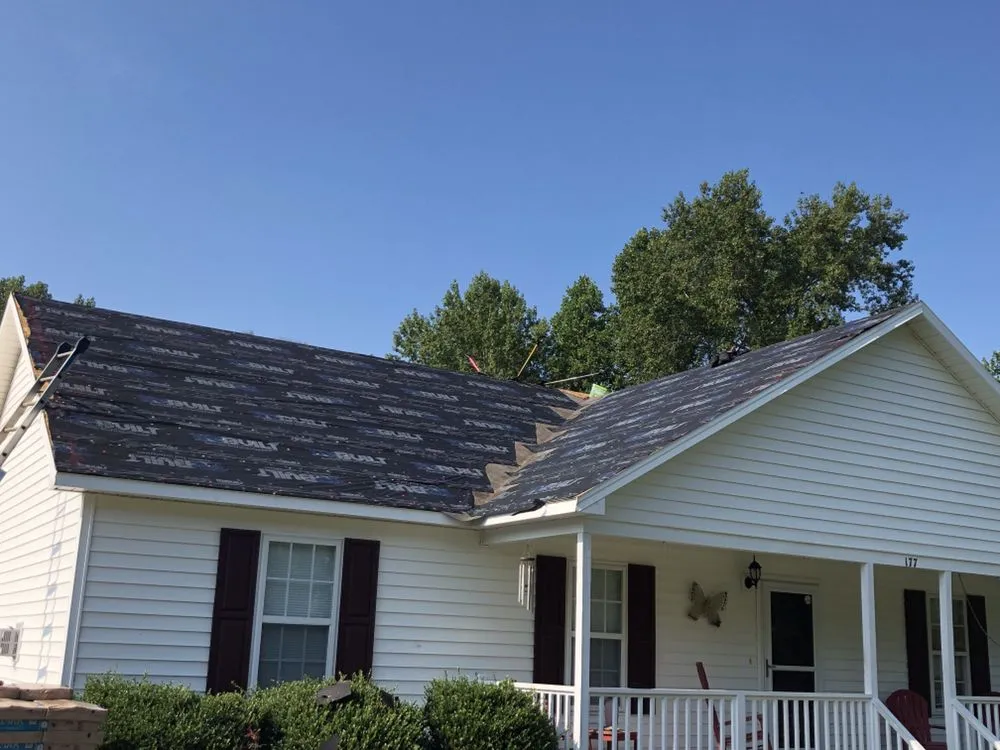 Slide of Canaan Roofing