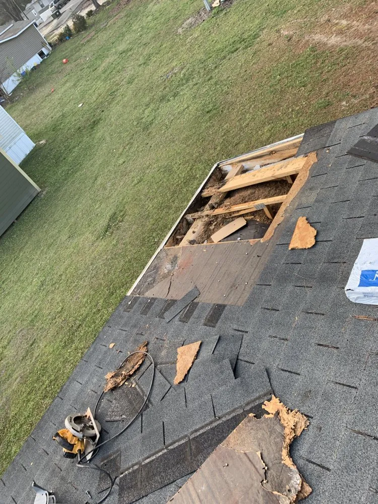 Slide of Canaan Roofing