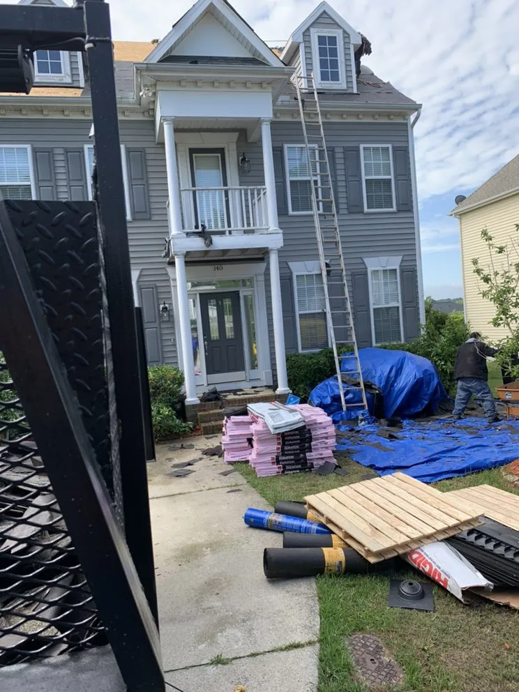 Slide of Canaan Roofing