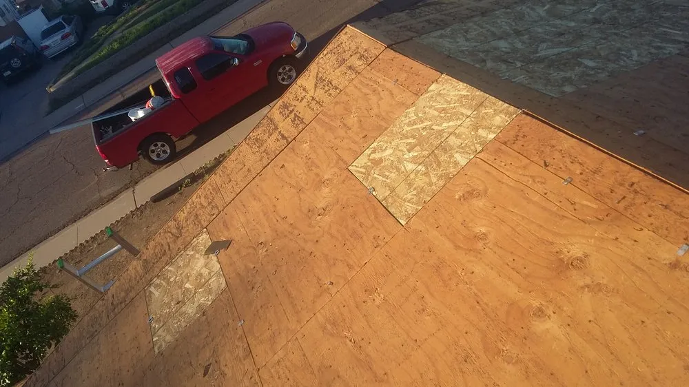 Slide of Canaan Roofing