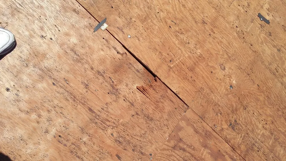 Slide of Canaan Roofing