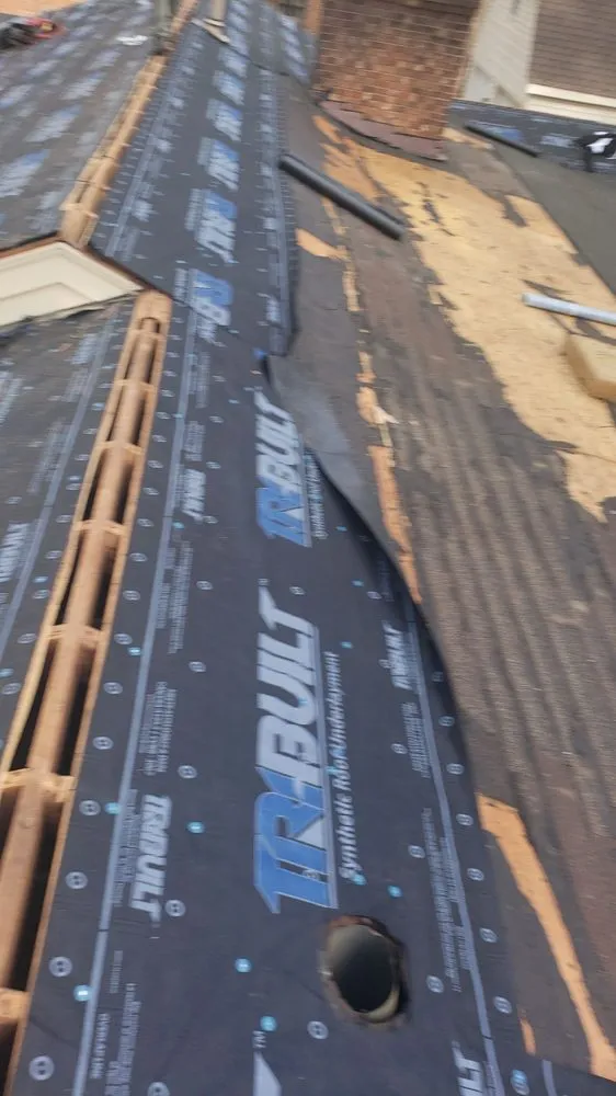 Slide of Canales Roofing