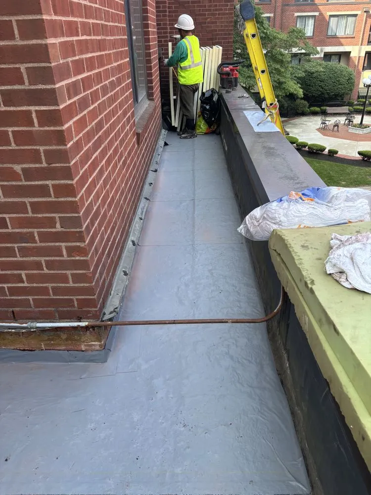 Slide of Capital Roof Company