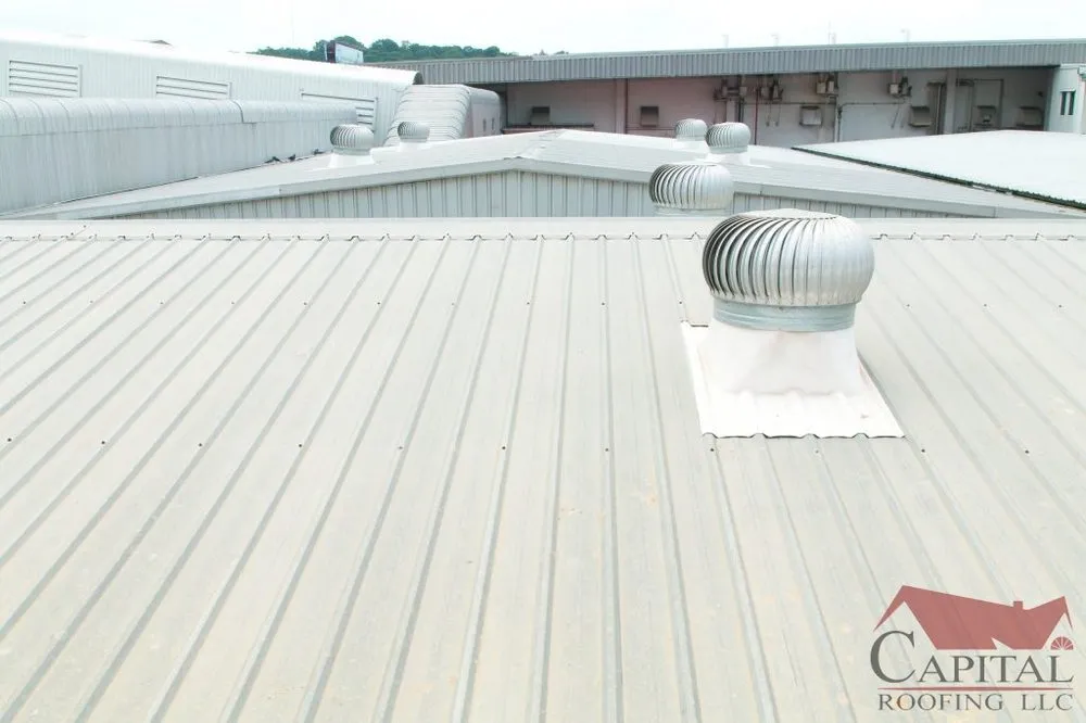 Slide of Capital Roofing