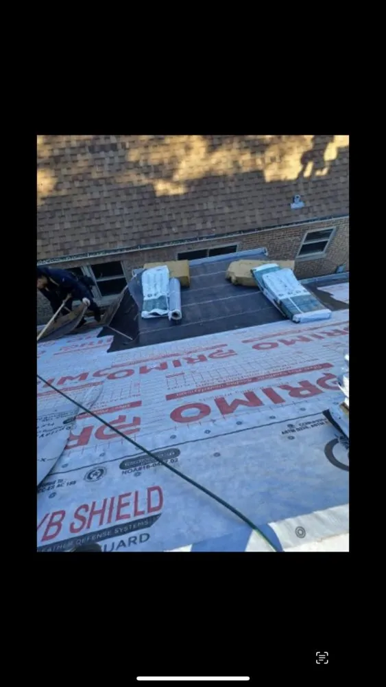Slide of Capital Roofing Construction