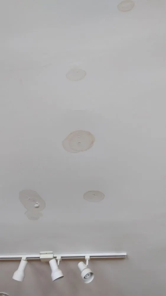 Slide of Capital Roofing Construction