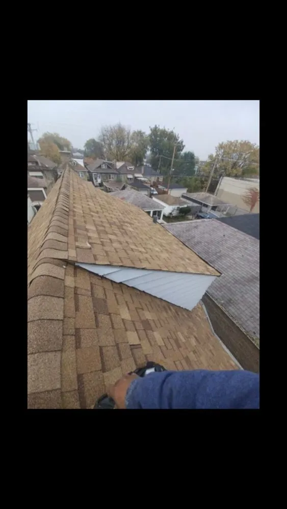 Slide of Capital Roofing Construction