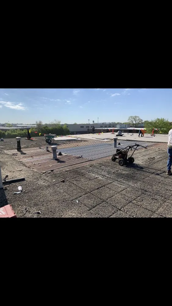 Slide of Capital Roofing Construction