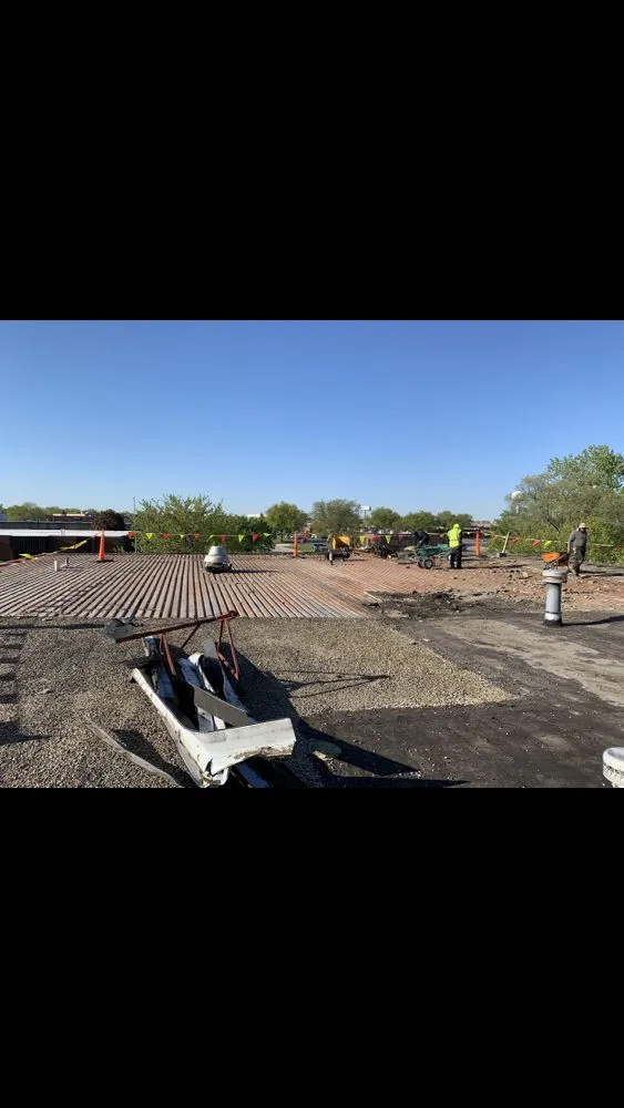 Slide of Capital Roofing Construction