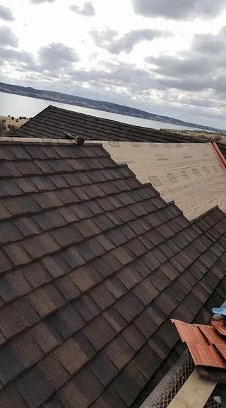 Slide of Capital Roofing