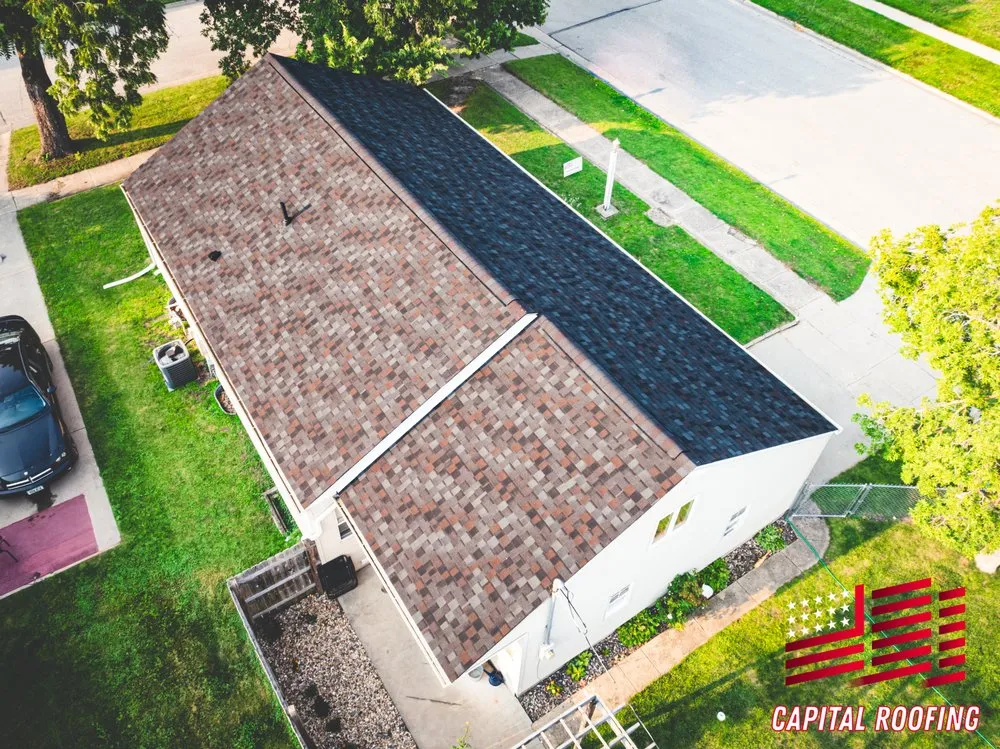 Slide of Capital Roofing