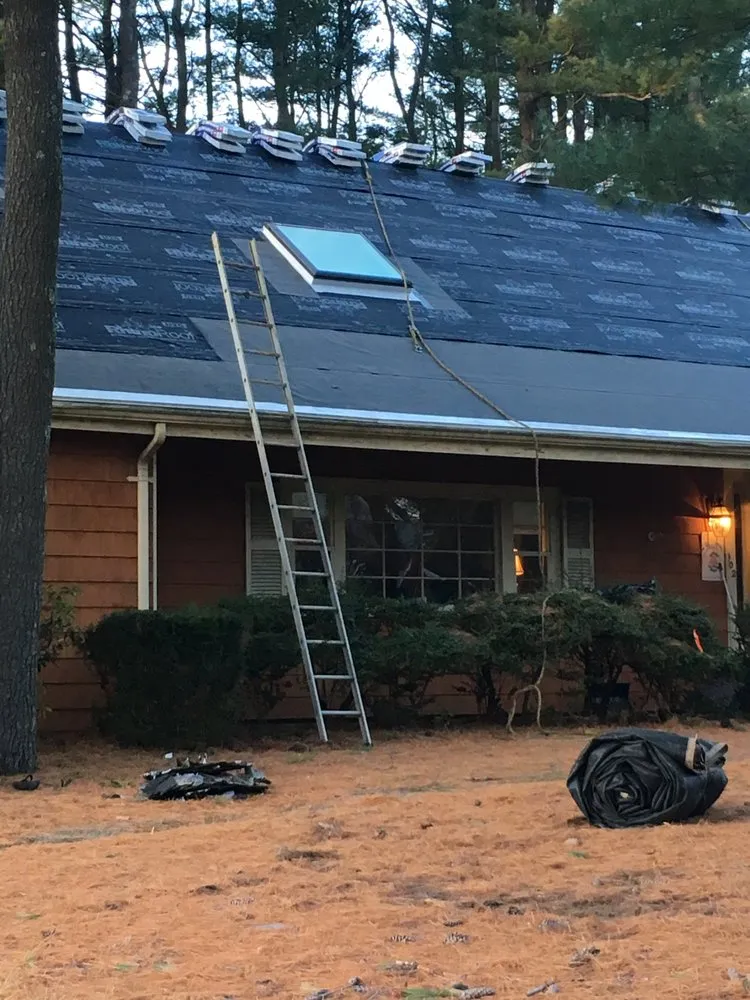 Slide of Capitol Roofing