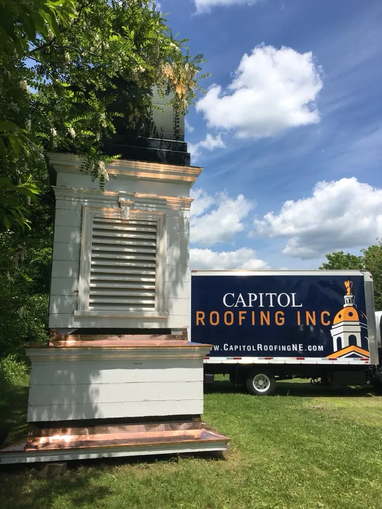 Slide of Capitol Roofing