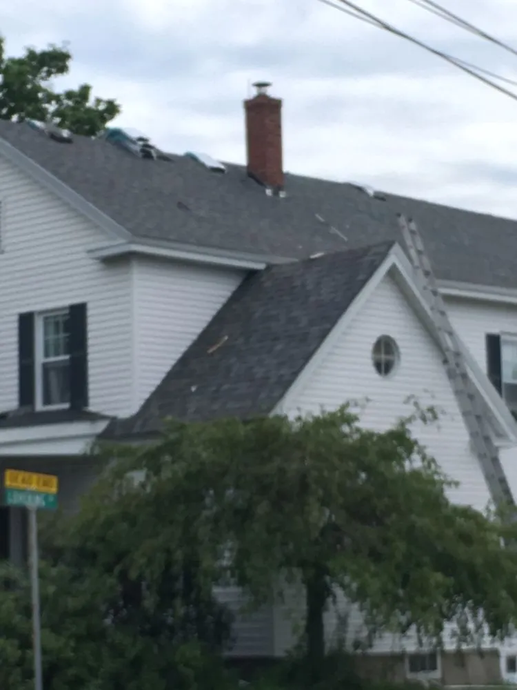 Slide of Capitol Roofing