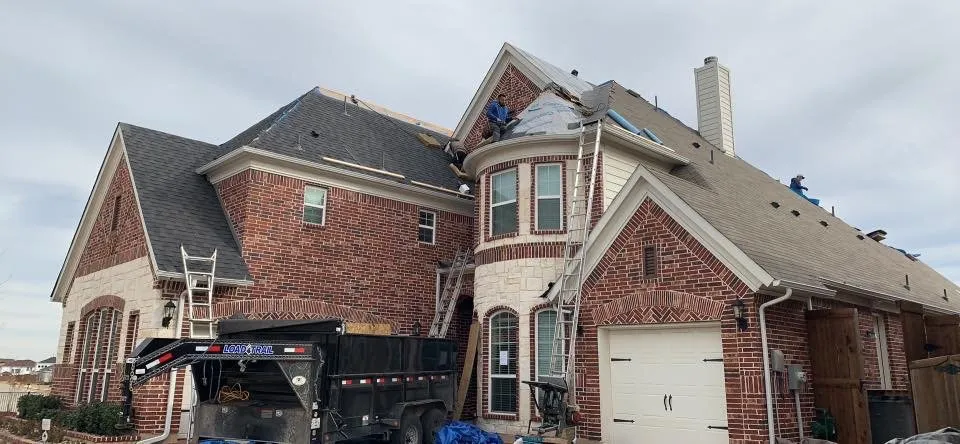 Slide of Capstone Roofing and Construction