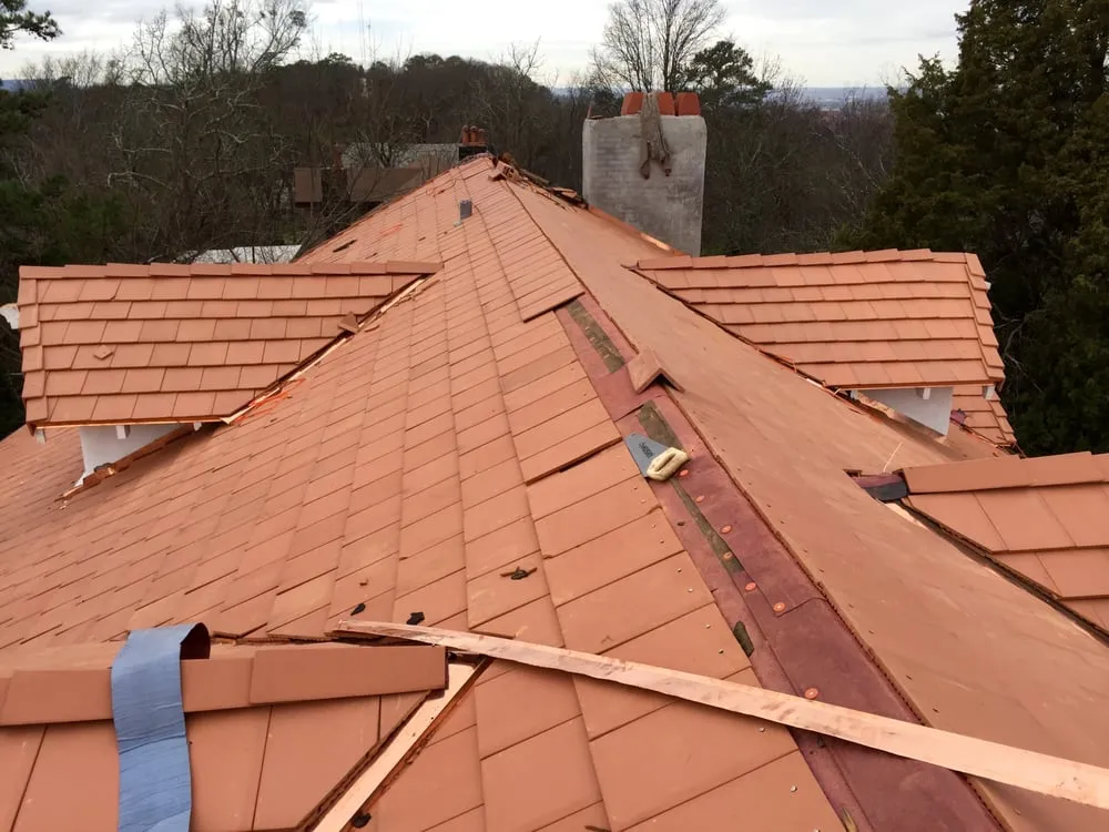 Slide of Capstone Roofing