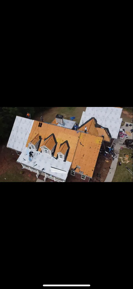 Professional shingle roofing service in Juliette, GA by Capstone Roofing
