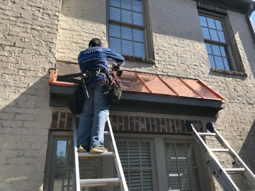 Slide of Capstone Roofing