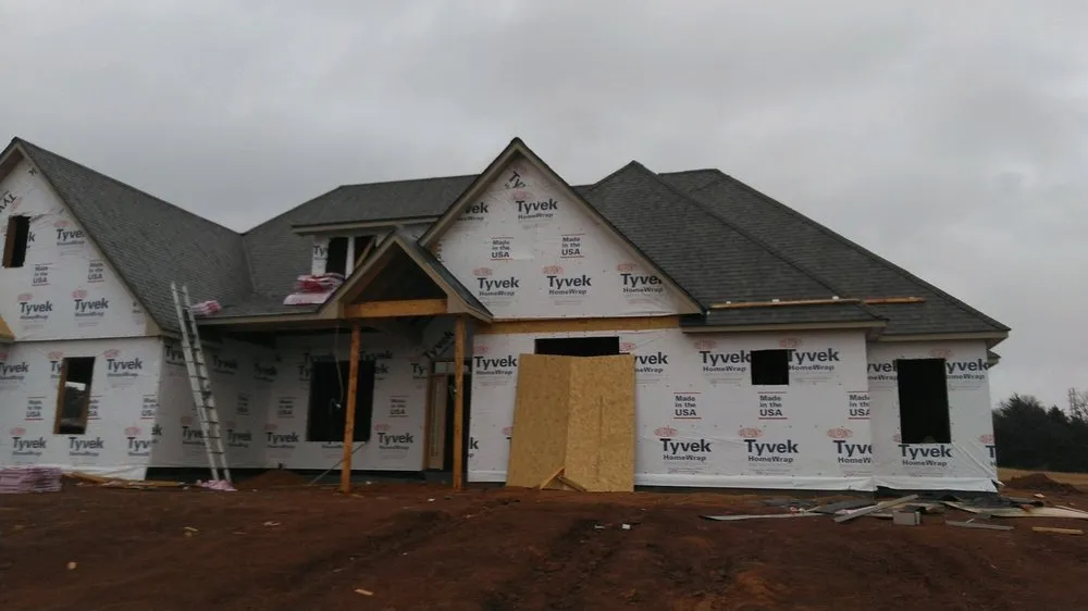 Slide of Capstone Roofing