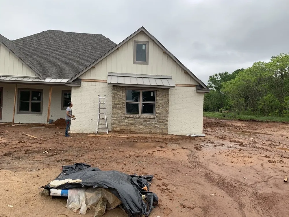 Slide of Capstone Roofing