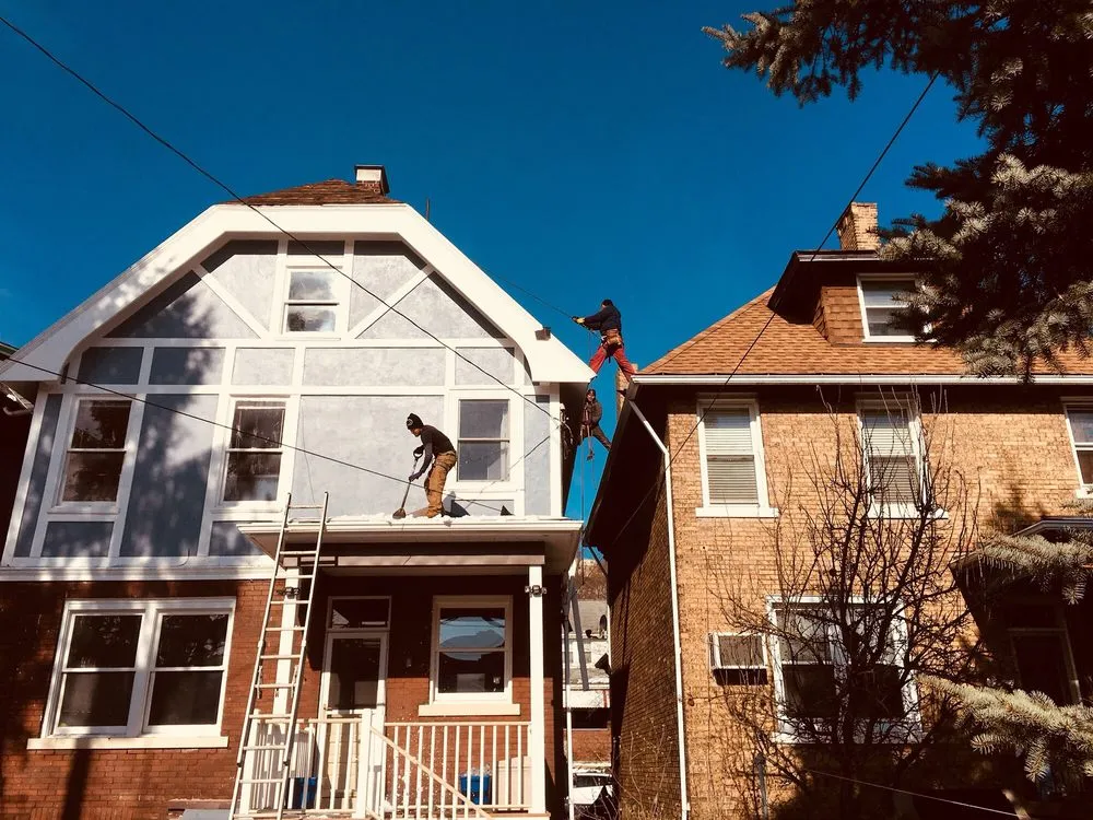 Licensed flat roof repair for residential properties across Rillton, PA - Caputo Construction