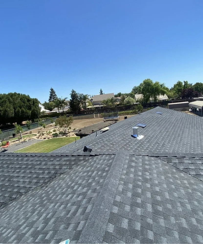 Slide of Cardenas Roofing & Gutter