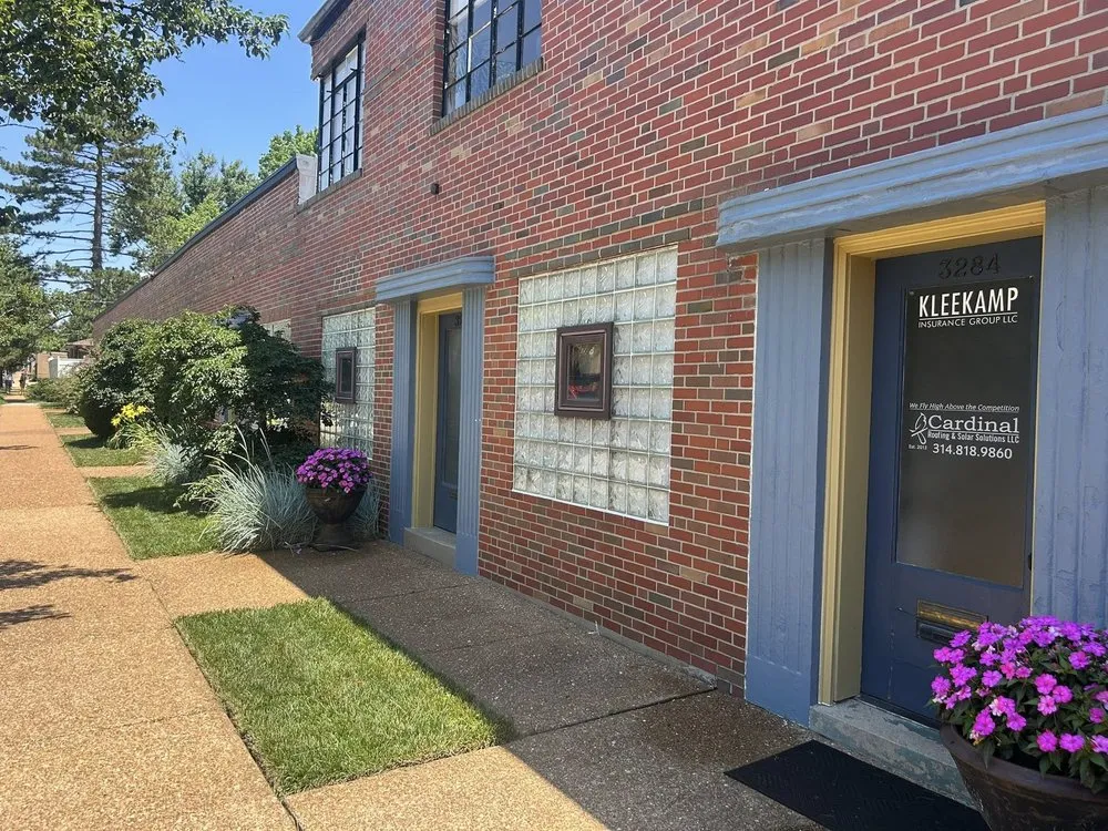 Local flat roof repair experts serving St. Louis, MO - Cardinal Roofing & Solar Solutions