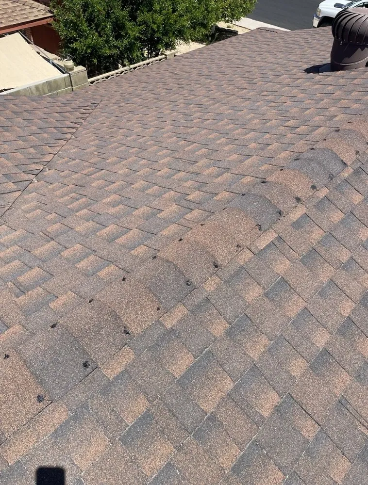 Slide of Cardinal Roofing