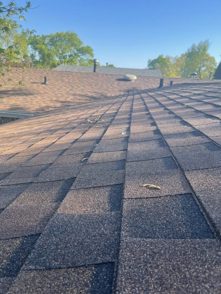 Slide of Care Roofing & Construction