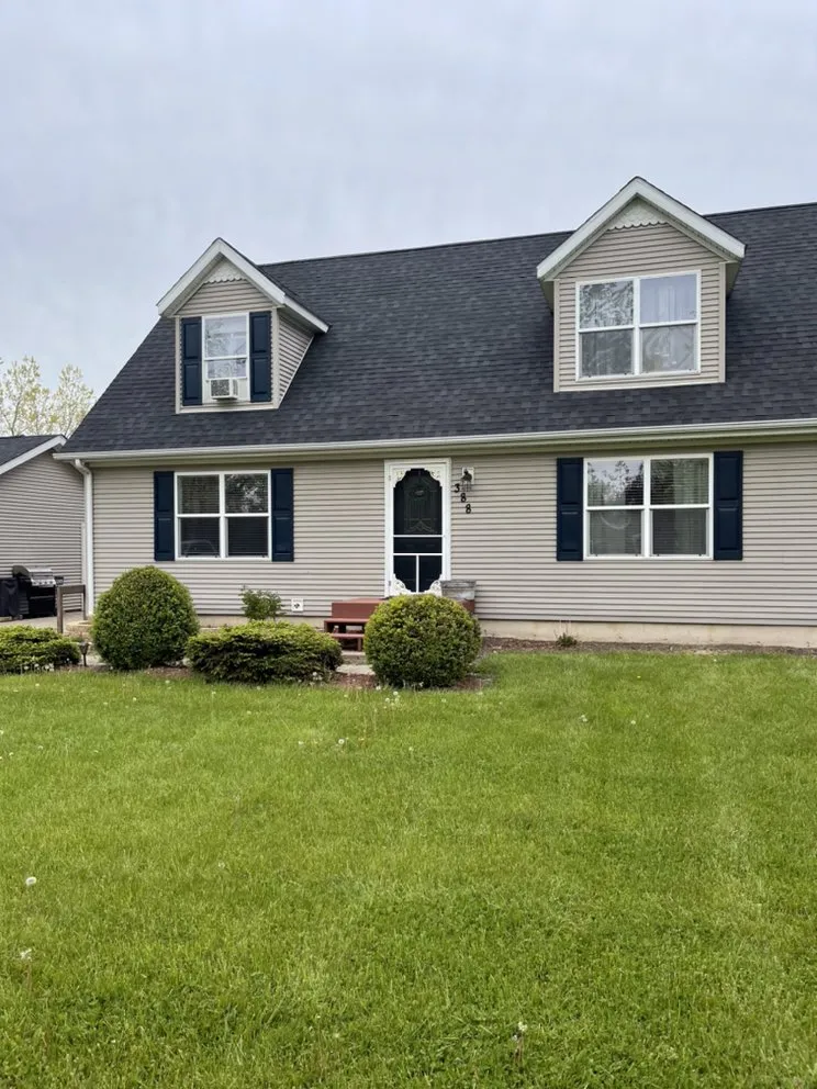 Slide of Care Roofing & Construction